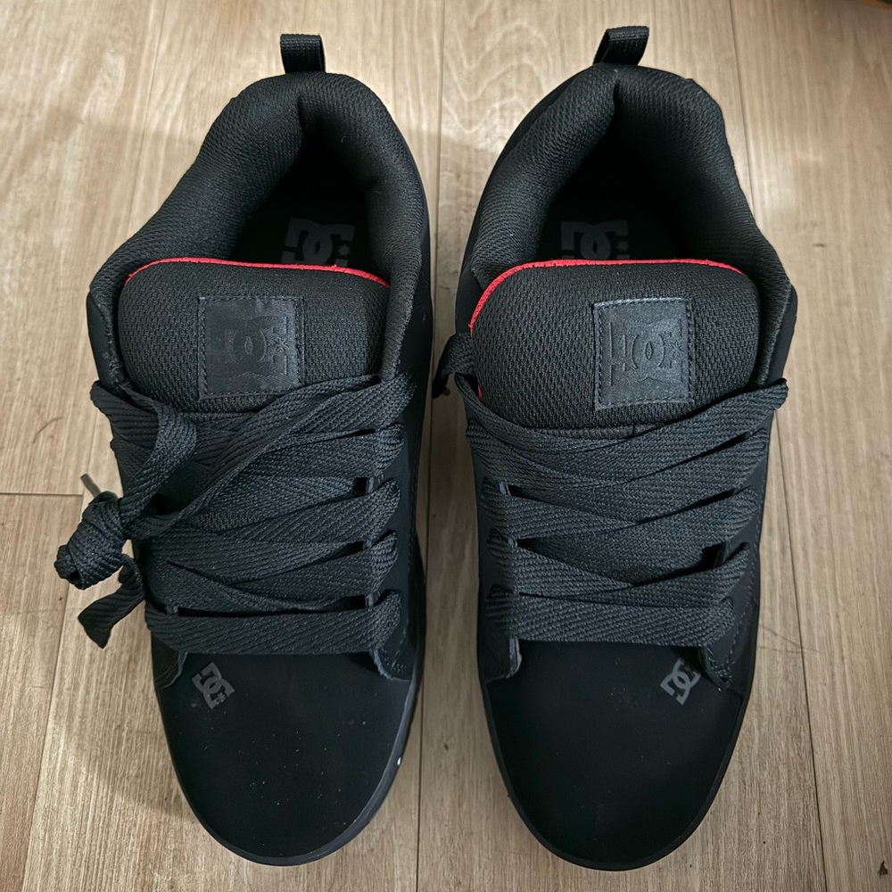DC Men's Black Sneakers with Red Trim